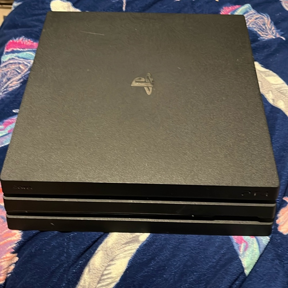 PS4 with game and controller